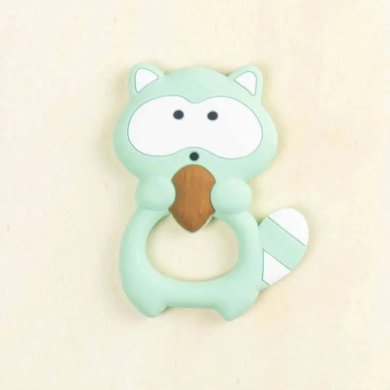 mint green squirrel silicone teether with acorn detail and ring design for babies BPA-free teething toy