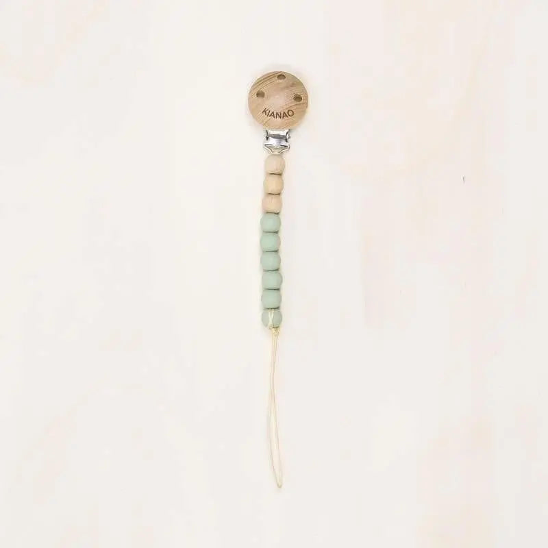 mint green wooden and silicone pacifier clip with beaded design and secure metal clasp