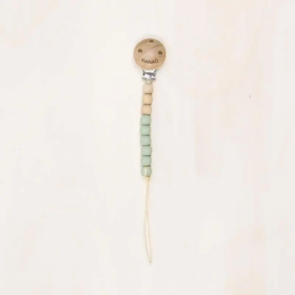  mint green wooden and silicone pacifier clip with beaded design and secure metal clasp