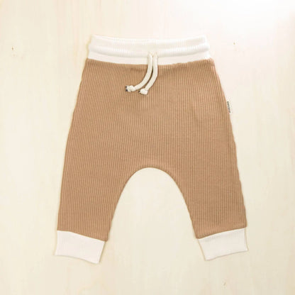 mocha organic cotton baby pants with white trim detailing, sustainable retro jogger style with adjustable drawstring waist