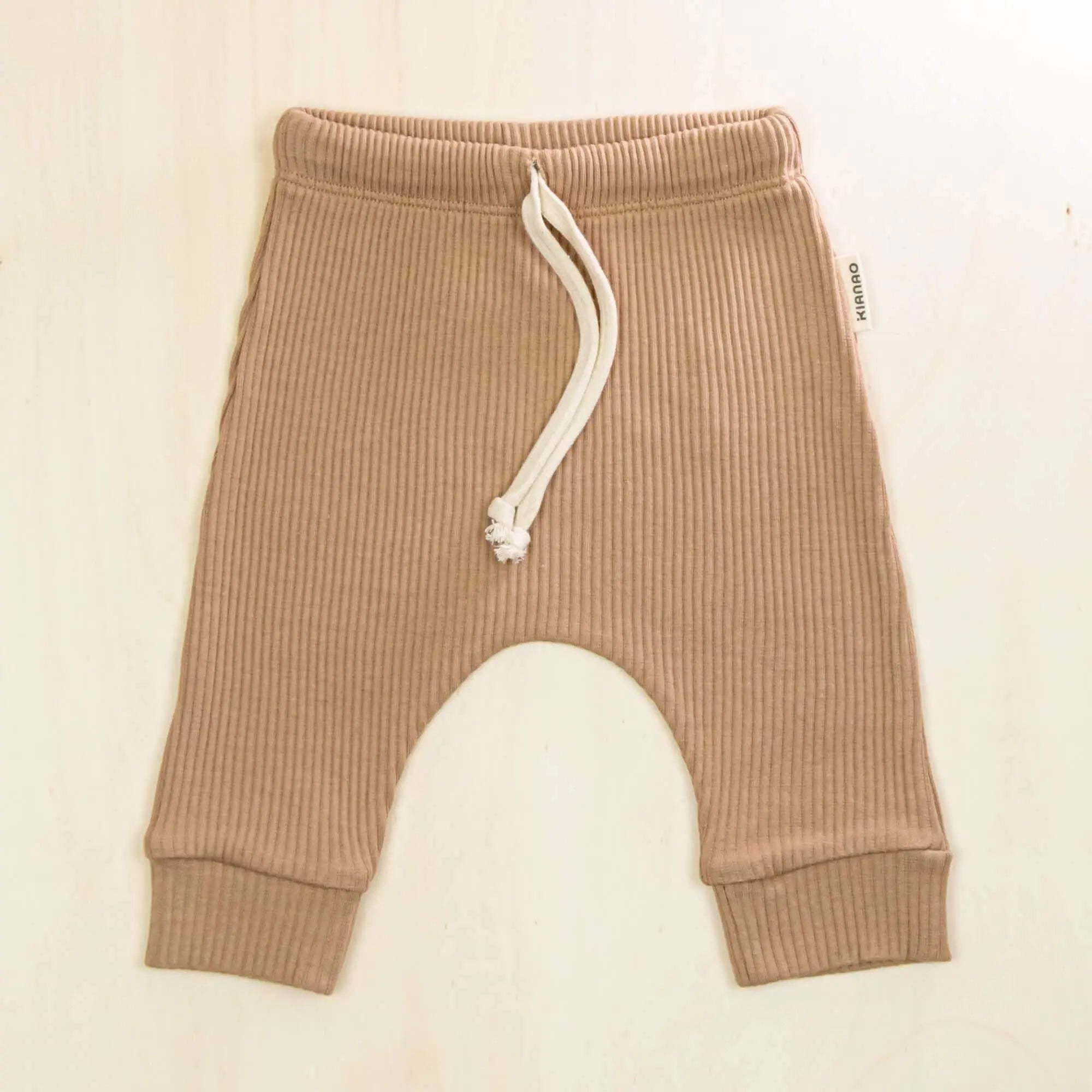 mocha baby pants featuring soft organic cotton ribbed texture, comfortable drawstring waist and gentle elastic cuffs