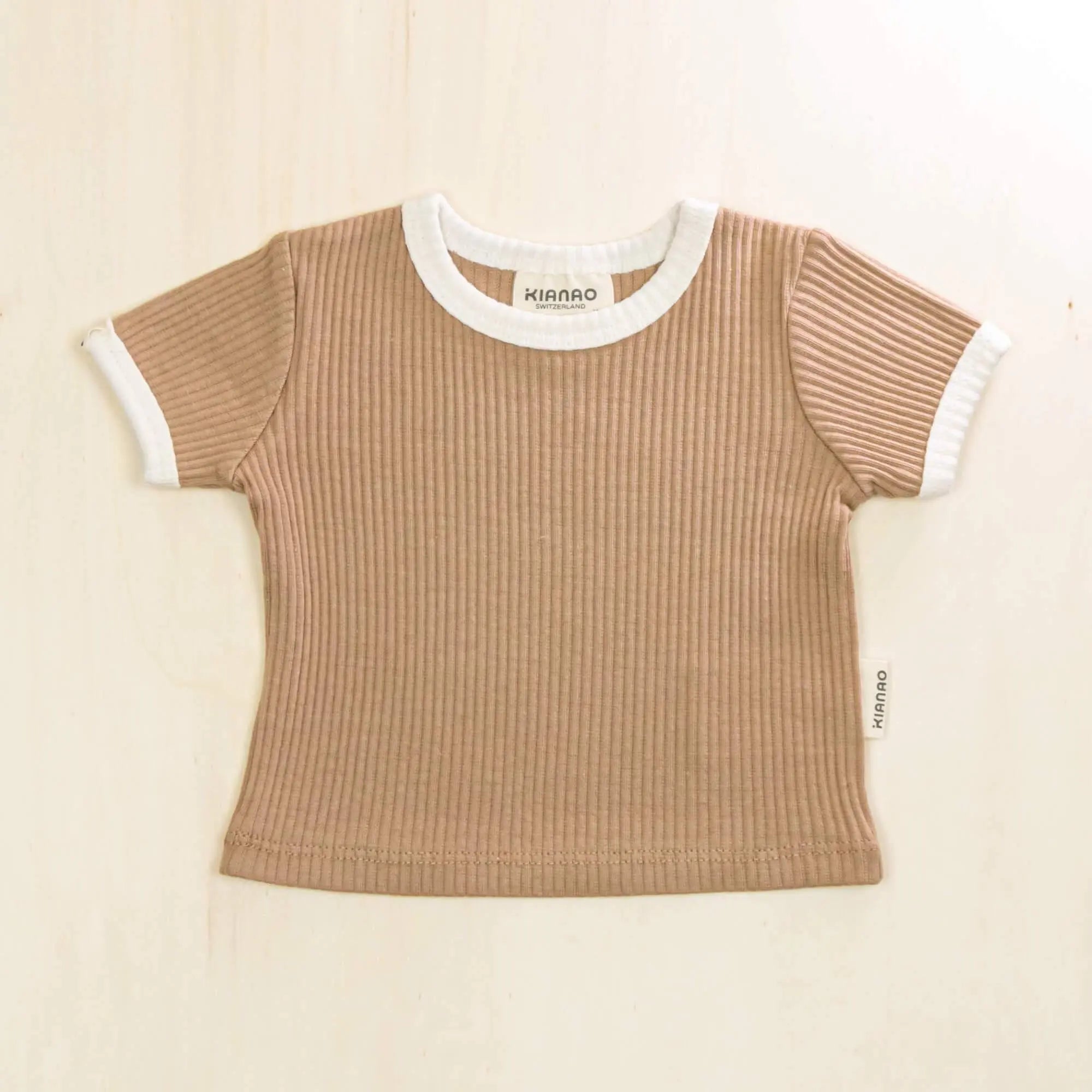 mocha organic cotton baby shirt with white ringer collar and cuffs in soft ribbed fabric