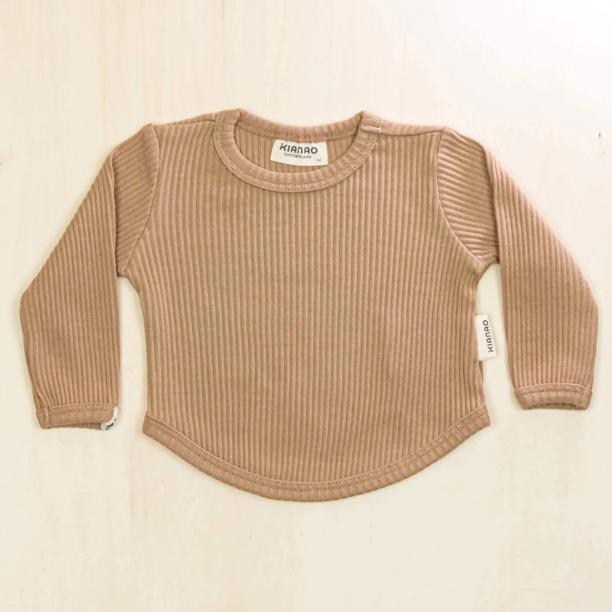 mocha organic cotton baby shirt with ribbed texture and long sleeves, sustainable baby clothing with stretch