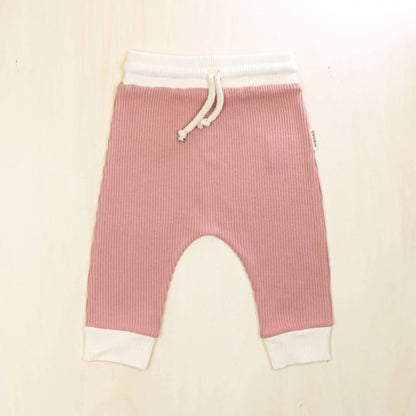 old rose organic cotton baby pants with white contrast cuffs, retro jogger design perfect for active babies and toddlers