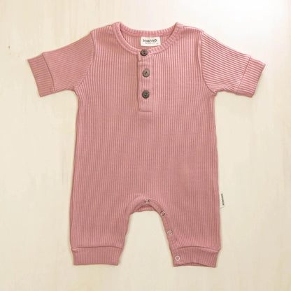 old rose organic cotton button-front baby romper made with 95% organic cotton for sensitive skin
