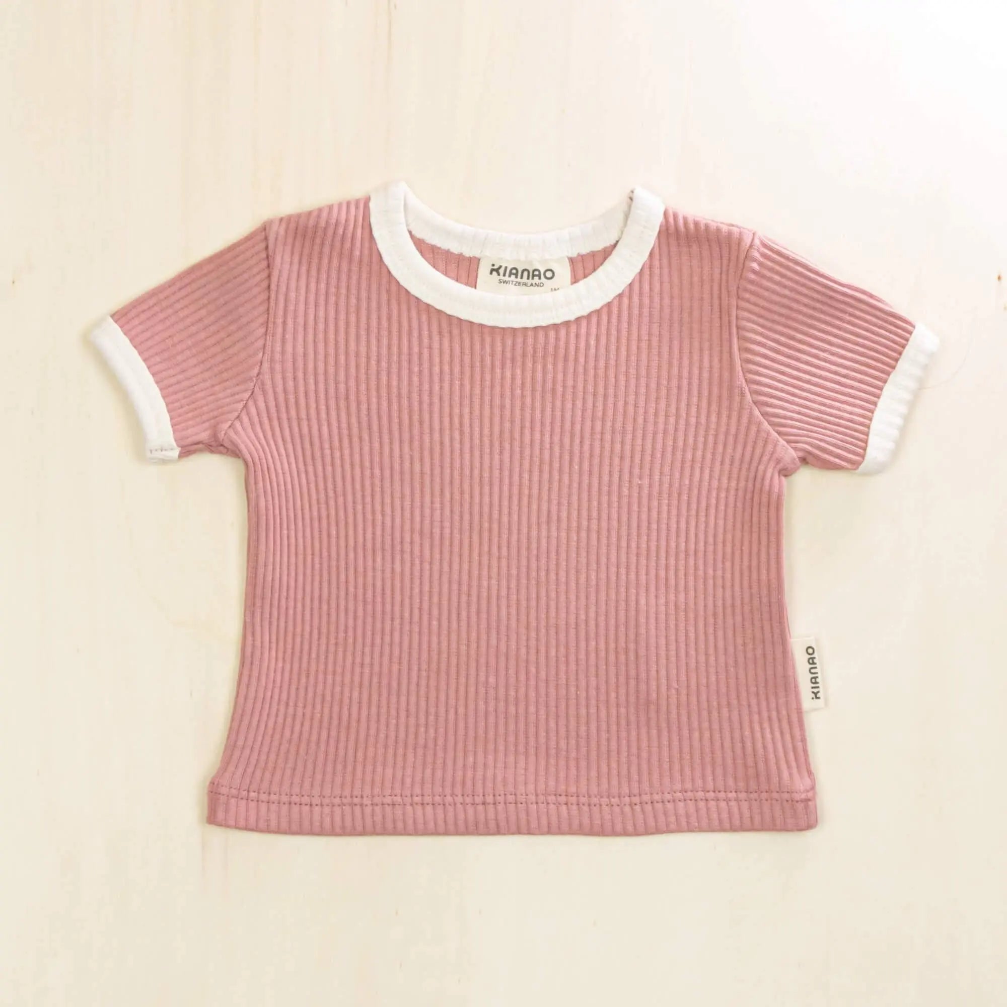 old rose organic cotton baby tee with white trim in soft ribbed fabric for all-day comfort