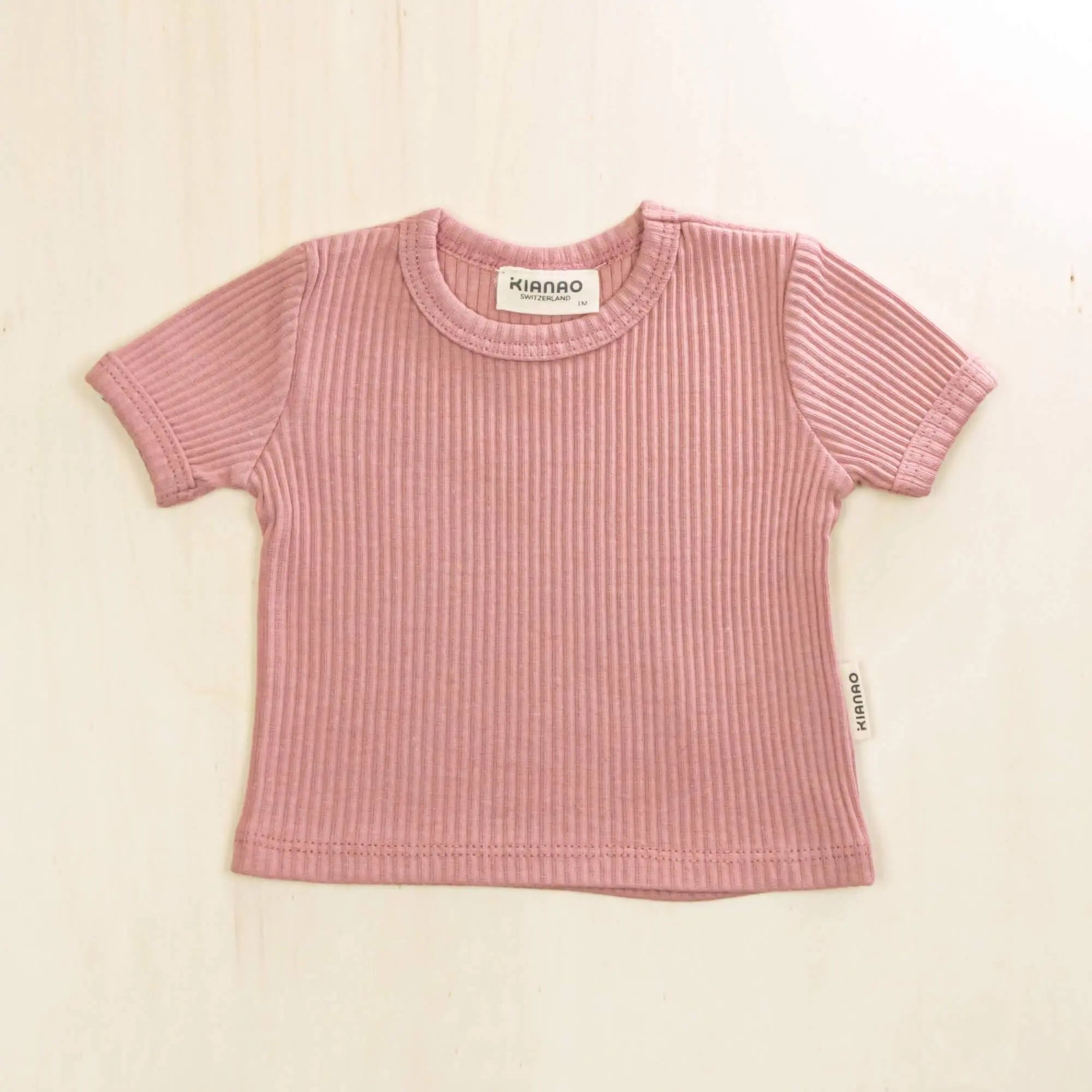 old rose organic cotton baby t-shirt with ribbed texture and short sleeves, comfortable stretch fit for growing babies