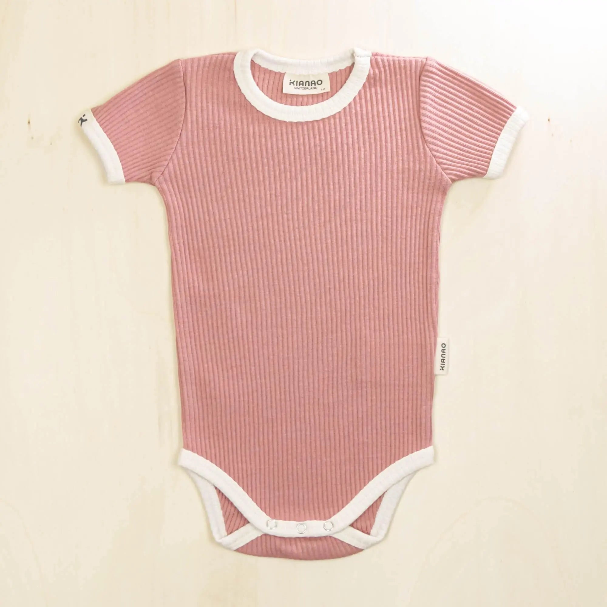 old rose short sleeve organic cotton baby bodysuit made from 95% organic cotton with stretchy ribbed texture
