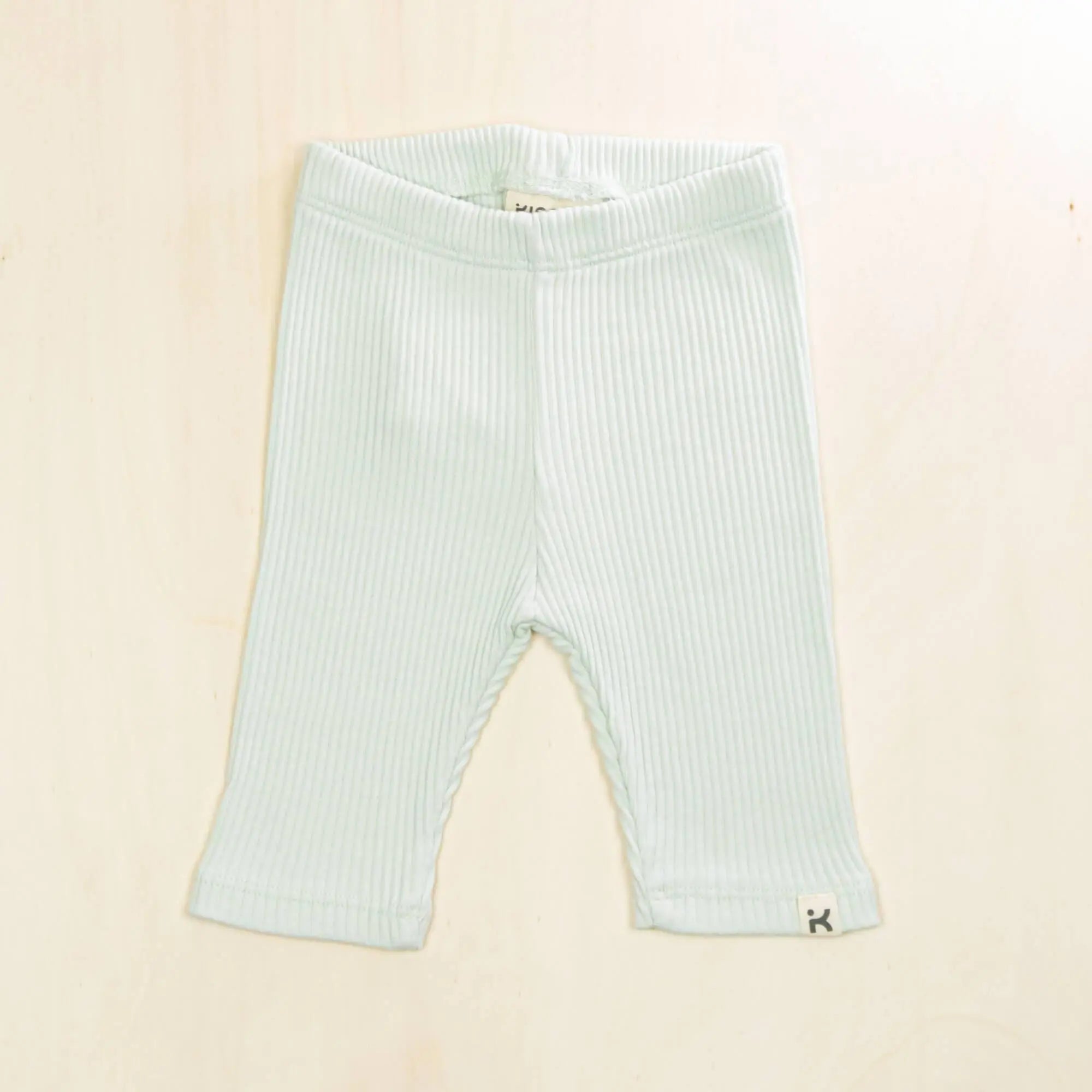 pale turquoise organic cotton baby leggings with ribbed texture and gentle elastic waistband for active babies
