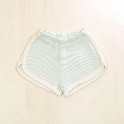pale turquoise organic cotton baby shorts with white trim detailing, ribbed texture for active babies and toddlers