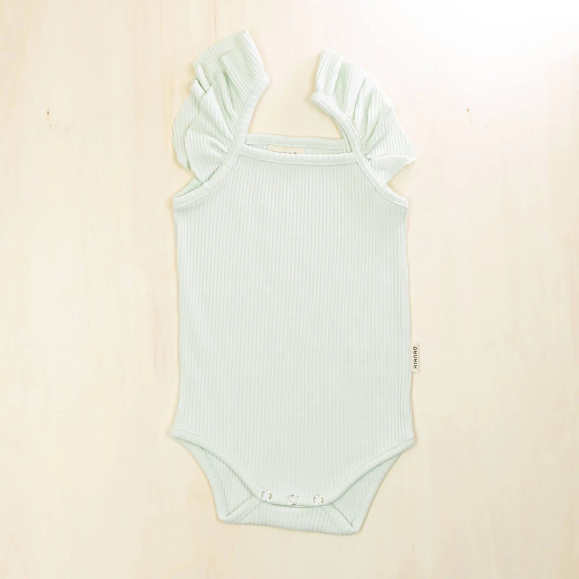 pale turquoise flutter sleeve organic cotton baby bodysuit with gentle ruffled sleeves and reinforced snap closures