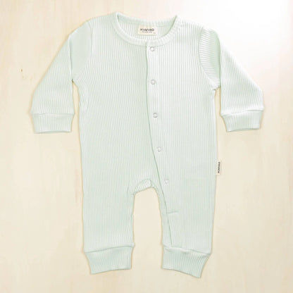 pale turquoise organic cotton baby romper featuring soft, breathable fabric ideal for sleep and play