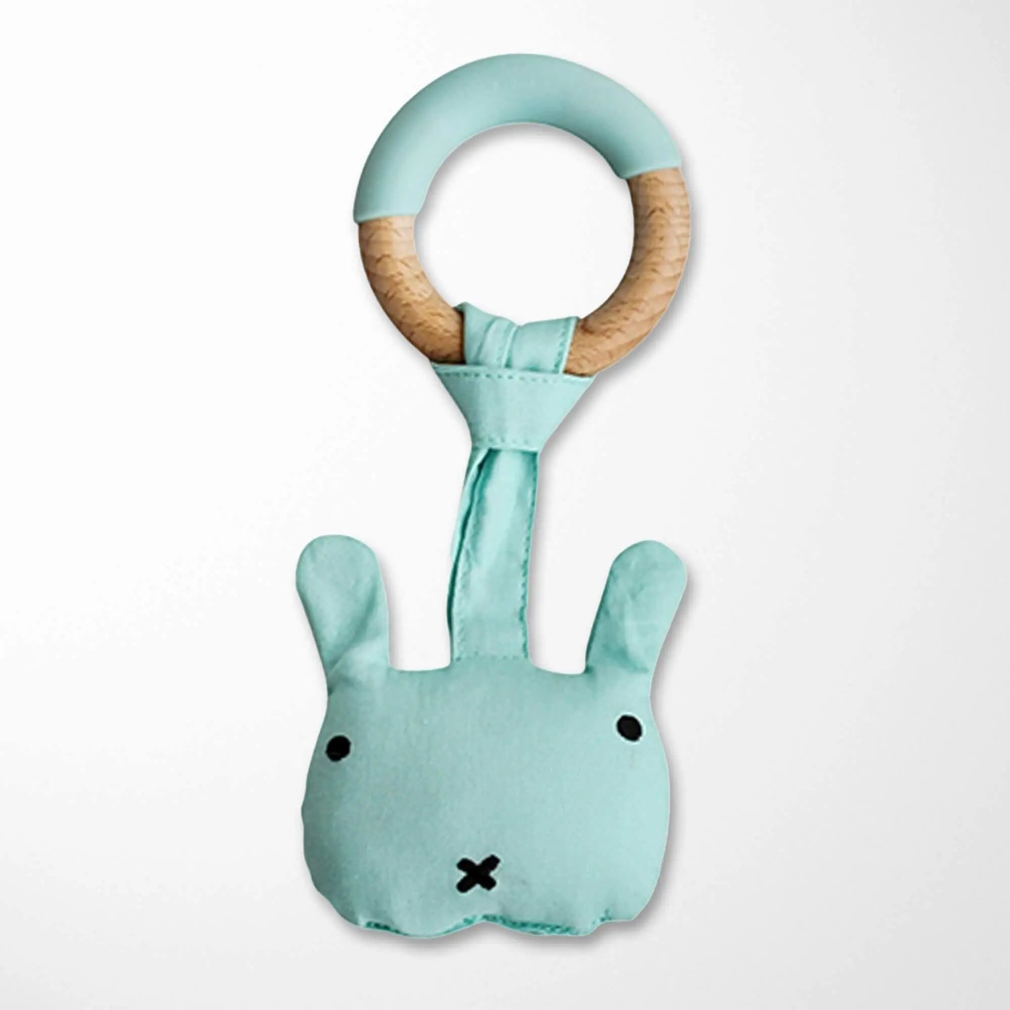 pale turquoise plush monster rattle teething toy with wooden ring, organic cotton baby teether in soft blue-green color