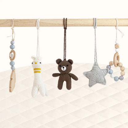 Front view of Panda Play Gym with all toys visible showcasing the monochrome grey and natural wood palette