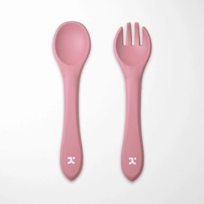 pink silicone baby spoon and fork set with soft-touch material gentle on baby gums and teeth