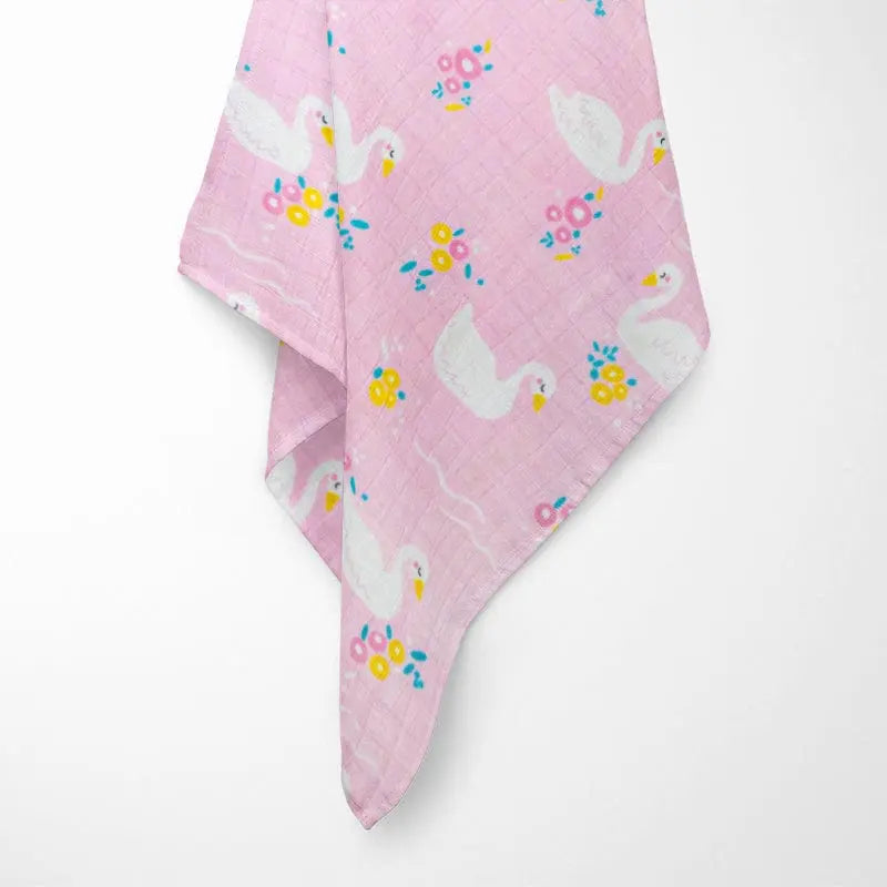close-up of pink bamboo baby blanket texture showing breathable weave and vibrant swan design