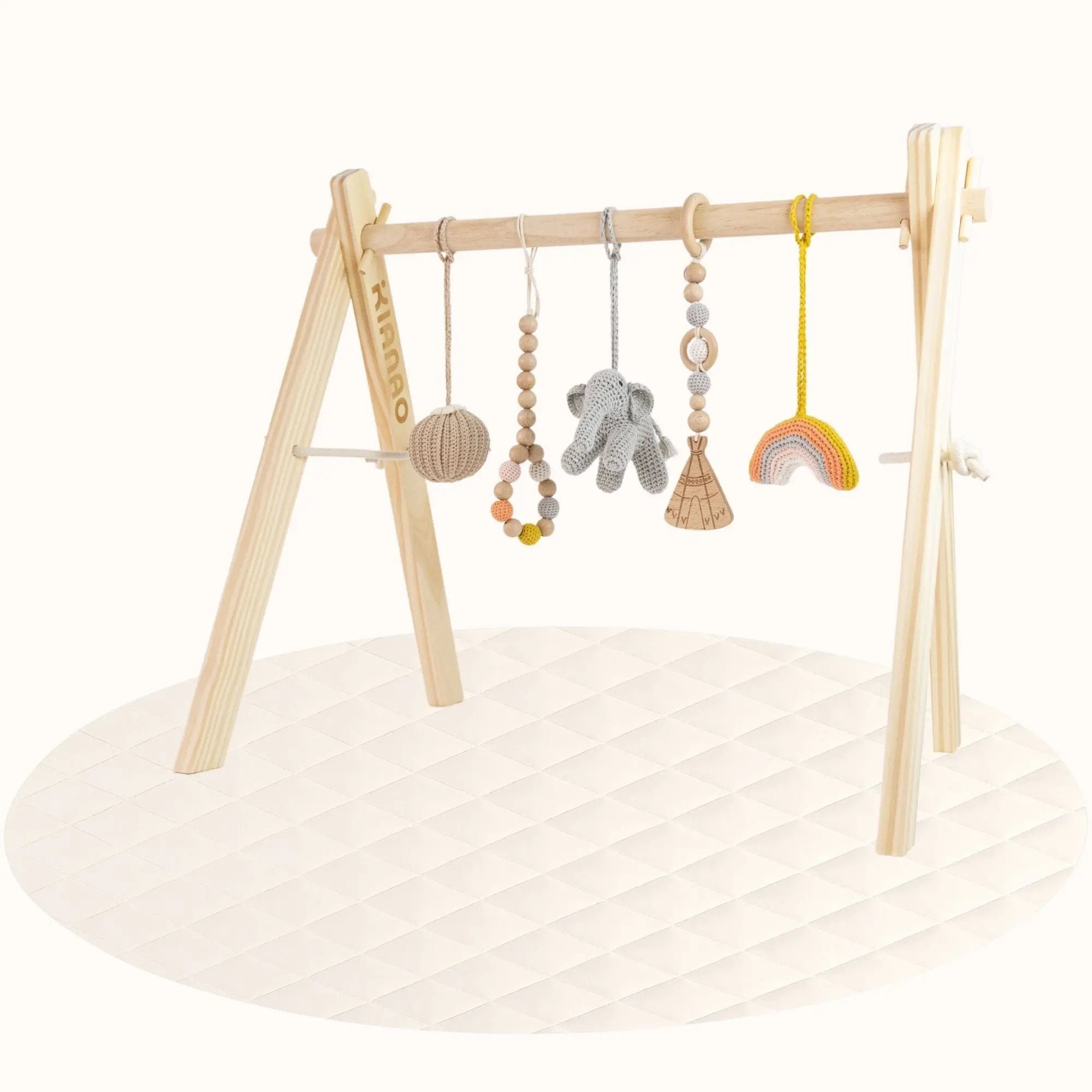 Side view of wooden Rainbow Play Gym showing sturdy A-frame design with hanging animal-themed toys