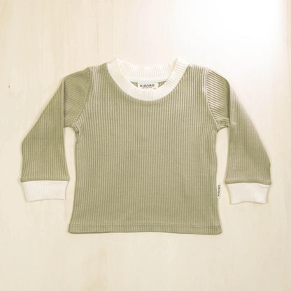 sage green organic cotton baby sweater with white contrast collar and cuffs, soft sustainable fabric for sensitive skin