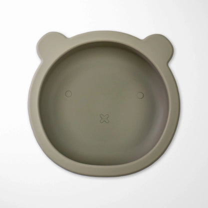 sage green silicone bear bowl with powerful suction cup that keeps meals in place during active toddler feeding sessions