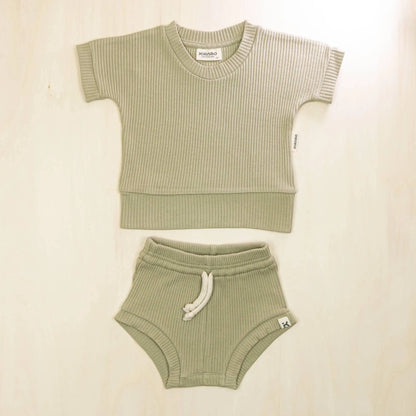 sage green organic cotton baby outfit featuring soft two-piece design perfect for warm weather play