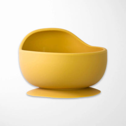 sand yellow baby bowl with secure suction base, made from stain-resistant silicone perfect for messy meals and learning eaters