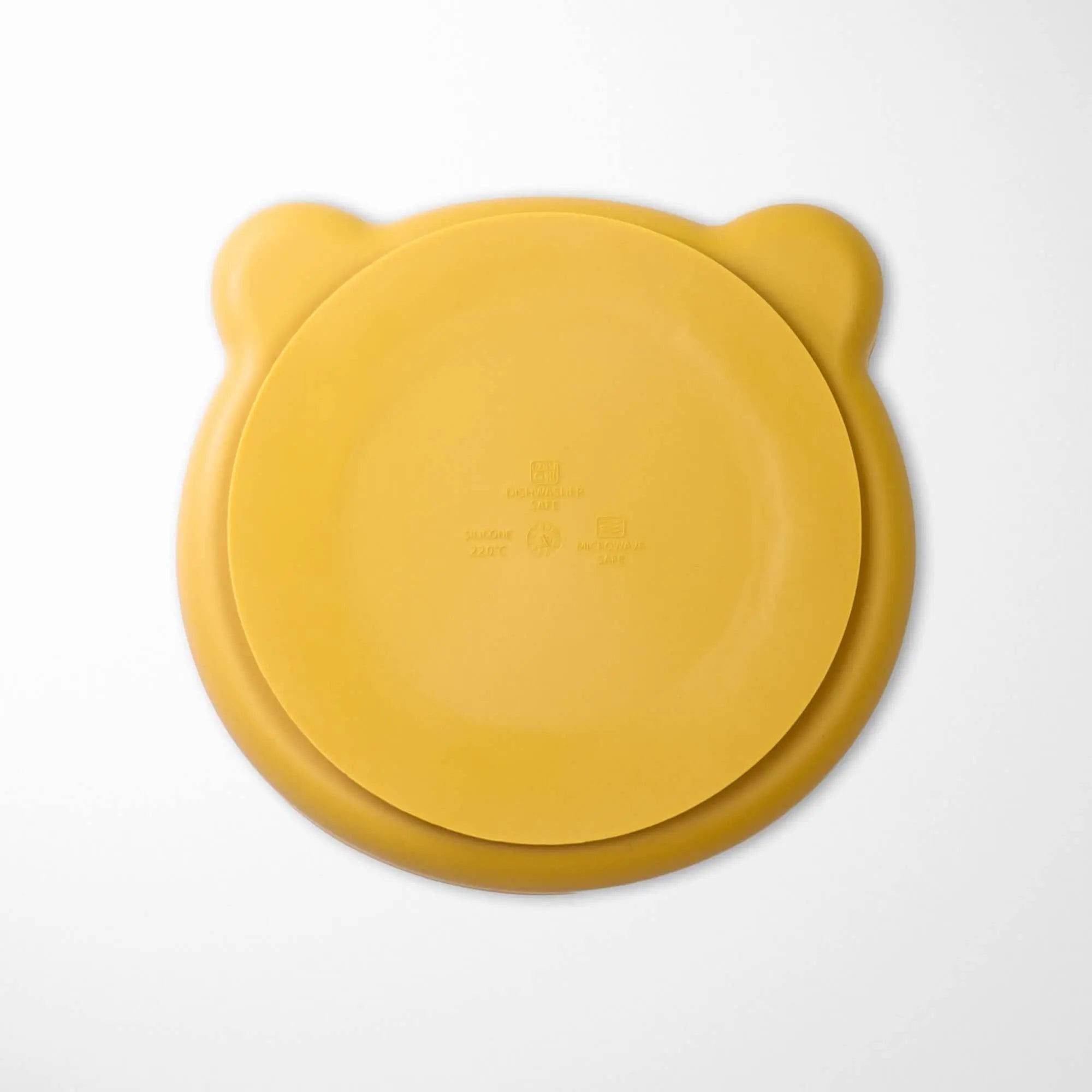 Back view of Sand Yellow baby silicone plate revealing the strong suction base that keeps plate secure