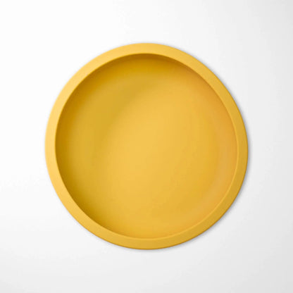 sand yellow baby suction bowl made of food-grade silicone with secure attachment to smooth surfaces
