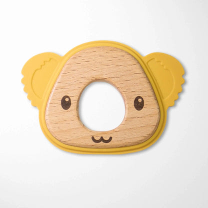 sand yellow koala silicone and wood teether with circular wooden center and soft silicone outer ring with koala ears