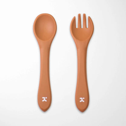 terra cotta silicone baby spoon and fork with rounded edges safe for infant self-feeding