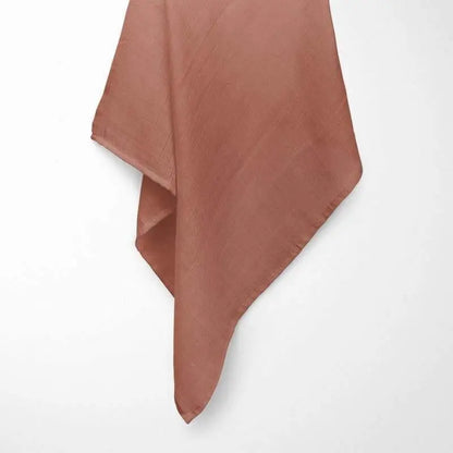 close-up of terracotta bamboo baby blanket weave, highlighting the breathable grid pattern and organic texture